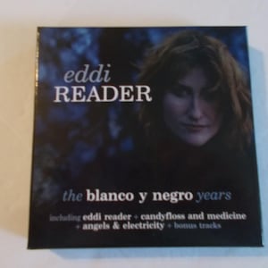 May include: A CD case featuring Eddi Reader with the text "the blanco y negro years." The cover has a dark background with a portrait of a woman. Additional text includes "including eddi reader + candyfloss and medicine + angels & electricity + bonus tracks."