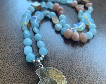 Natural aquamarine and sunstone handmade boho mala necklace.