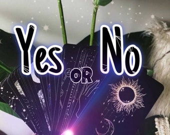 May include: A set of black tarot cards with white celestial designs, including a sun, moon, and stars. The cards are fanned out in a hand, with the text "Yes or No" above them.