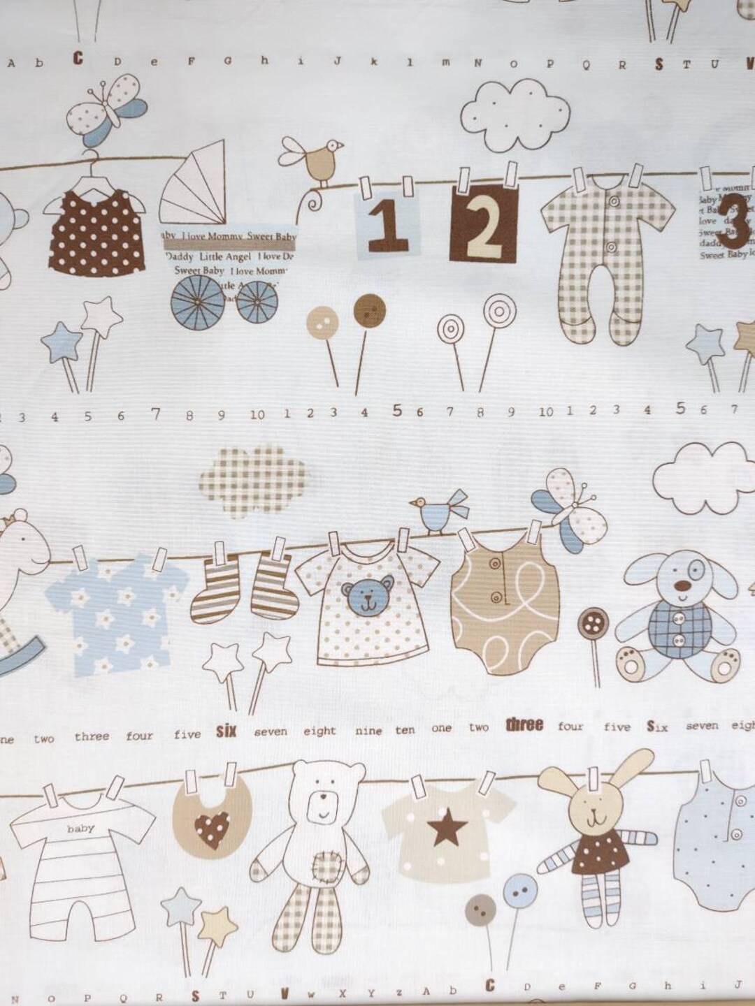 Baby Clothesline Brown Blue & White Quilting Cotton Fabric Marcus