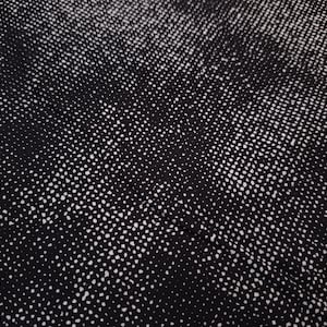 May include: Black fabric with a white polka dot pattern. The dots are small and evenly spaced.