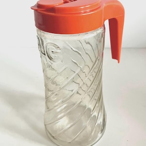 Vintage TANG Pitcher: Clear Glass and Screw Top, Pop Up Orange Plastic Lid