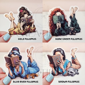 May include: Four stickers featuring illustrations of people in pajamas reading books. The stickers are labeled "GOLD PAJAMAS", "DARK GREEN PAJAMAS", "BLUE RUBY PAJAMAS", and "BROWN PAJAMAS". Each illustration depicts a person lying down, reading a book, and wearing pajamas.