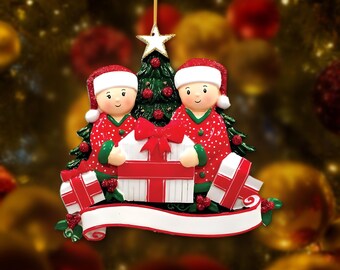 Couple Ornament 2026, Personalized Pair in Pajamas and Santa Hats Opening a Big Present, Names, Gift for Couple, Christmas Keepsake