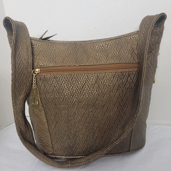 Tejrasila-Khaki print women's Shoulder handbag! Three outside pockets.Made with genuine leather in USA!