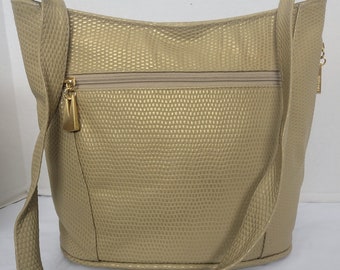 Tejrasila- Champagne print women's Shoulder handbag! Three outside pockets.Made with genuine leather in USA!
