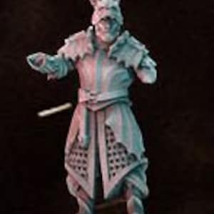 May include: A white, detailed miniature figure of a knight wearing armor with a helmet and a crown. The knight is holding a sword in its right hand and has a shield on its left arm.