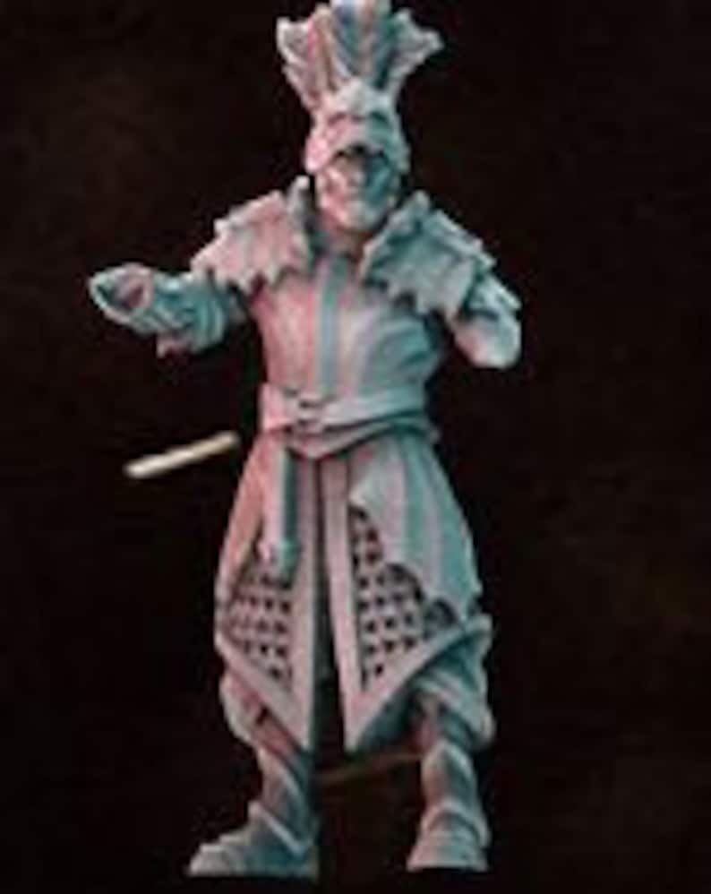 May include: A white, detailed miniature figure of a knight wearing armor with a helmet and a crown. The knight is holding a sword in its right hand and has a shield on its left arm.