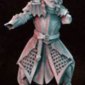 May include: A miniature figurine of a warrior wearing a helmet with a feather, chainmail armor, and a long, flowing cloak. The figure is painted in shades of blue and green.