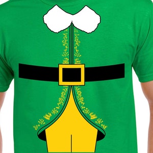 May include: Green t-shirt with a printed elf costume design. The design includes a white collar, a black belt with a gold buckle, and a yellow vest with gold trim.