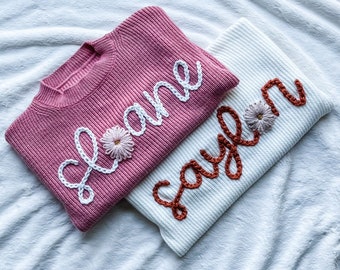 Add a Flower as a letter/large design to hand embroidered sweater