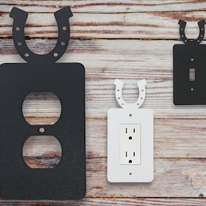 Horseshoe wall plate, cowboy socket cover