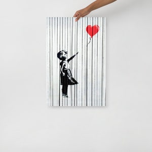 Pôster Banksy Balloon Girl desfiado e fixo