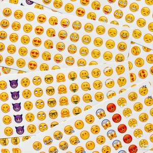 May include: A sheet of colorful emoji stickers with various expressions, including happy, sad, surprised, and angry. The stickers are arranged in rows and columns, and some are overlapping.