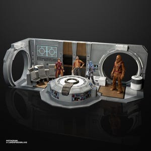 May include: A Star Wars action figure playset featuring a detailed interior cockpit with a central console, two chairs, and wall panels. Four figures are positioned within the structure, including a Wookiee, a blue-skinned character, and two others.
