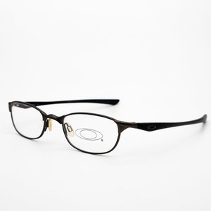 Oakley vintage eyeglasses, black, rectangular optical frame, new old stock