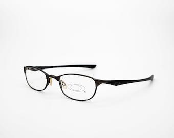 Oakley Vintage Brille, schwarz, rechteckiger optischer Rahmen, new old stock