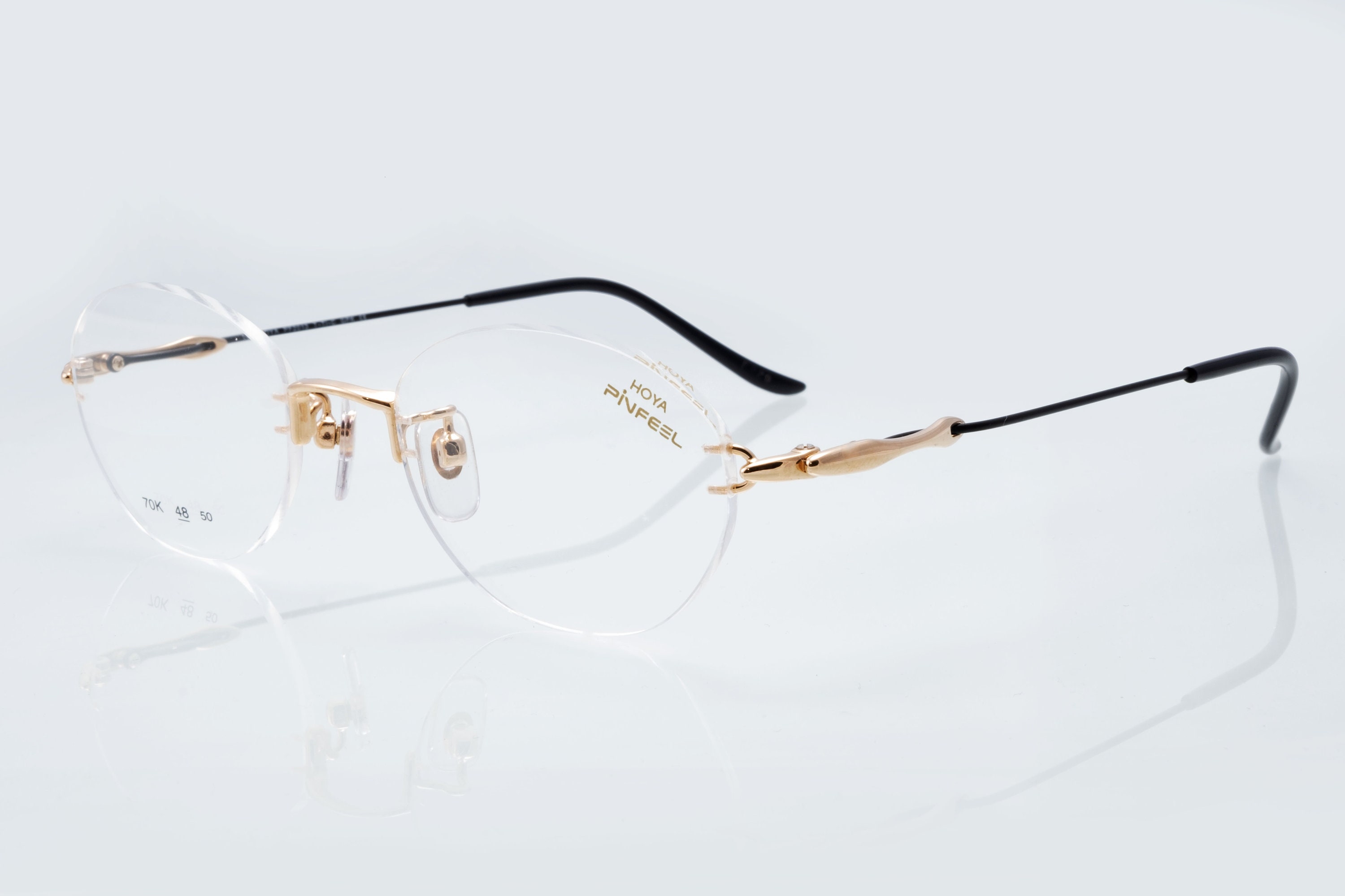 Hoya pinfeel vintage eyeglasess, oval rimless frame made in Hoya pinfeel vintage eyeglasess, oval rimless frame made in