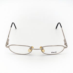 Dolce & Gabbana vintageglasögon, silverfärgade, ovala optiska bågar tillverkade i Italien, nya gamla lager