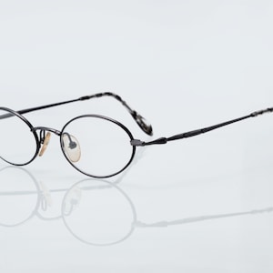 Alain Mikli " Mikli par Mikli" vintage eyeglasses, oval optical frame made in Japan, new old stock