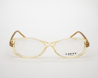 Lunettes de vue Loewe vintage, monture optique ovale transparente jaune fabriquée en Italie, neufs anciens stocks