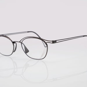 Donna Karan vintage eyeglasess, silver, optical frame made in Japan, new old stock