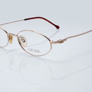 Escada vintage eyeglasses, gold, oval optical frame made in France, new old stock