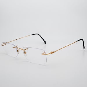 Flair Jet Set vintage eyeglasses, gold, rectangular rimless optical frame made in Germany, new old stock