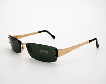 Gafas de sol vintage Moschino, fabricadas en Italia, stock nuevo y antiguo.