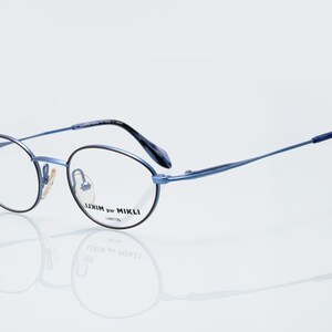 Alain Mikli " Mikli par Mikli" vintage eyeglasses, oval optical frame made in Japan, new old stock