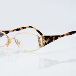 Roberto Capucci vintage eyeglasses, gold, tortoise, oval optical frame made in Italy, new old stock