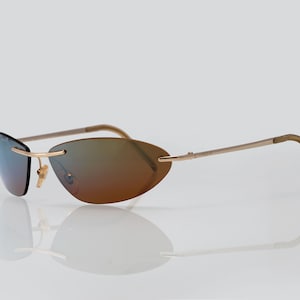 Vogue vintage sunglasses, rimless, oval, new old stock