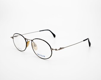 Titan by Metzler Eyeglasses Frames Sivler Gold Oval Full Rim  display picture 1