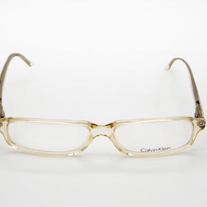 Calvin Klein vintage eyeglasses, transparent rectangular optical frame made in Italy, new old stock