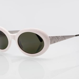 Valentino vintage sunglasses, oval cat eye, made in Italy, new old stock