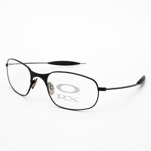 Oakley vintage eyeglasses, black, rectangular optical frame, new old stock