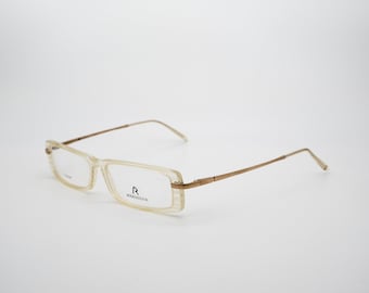 Rodenstock vintage eyeglasses, titanium, rectangular transparent optical frame with gold temples, made in Italy, new old stock