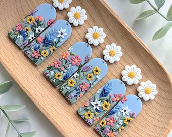 Bright and flowery long arch earrings with daisy studs handmade from polymer clay