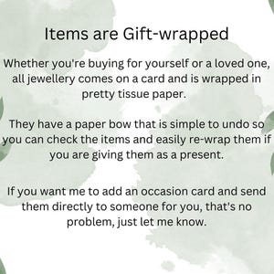May include: Text on a green watercolor background that reads "Items are Gift-wrapped".  The text explains that all jewelry comes on a card and is wrapped in pretty tissue paper with a paper bow that is easy to undo.  It also states that you can request an occasion card to be sent directly to someone for you.