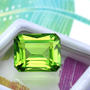 AAA+ Green Peridot Gemstone From Sri Lanka 10.45Carats Emerald Cut Peridot Stone Best For Peridot Ring And Any Kind Of Astrological Jewelry