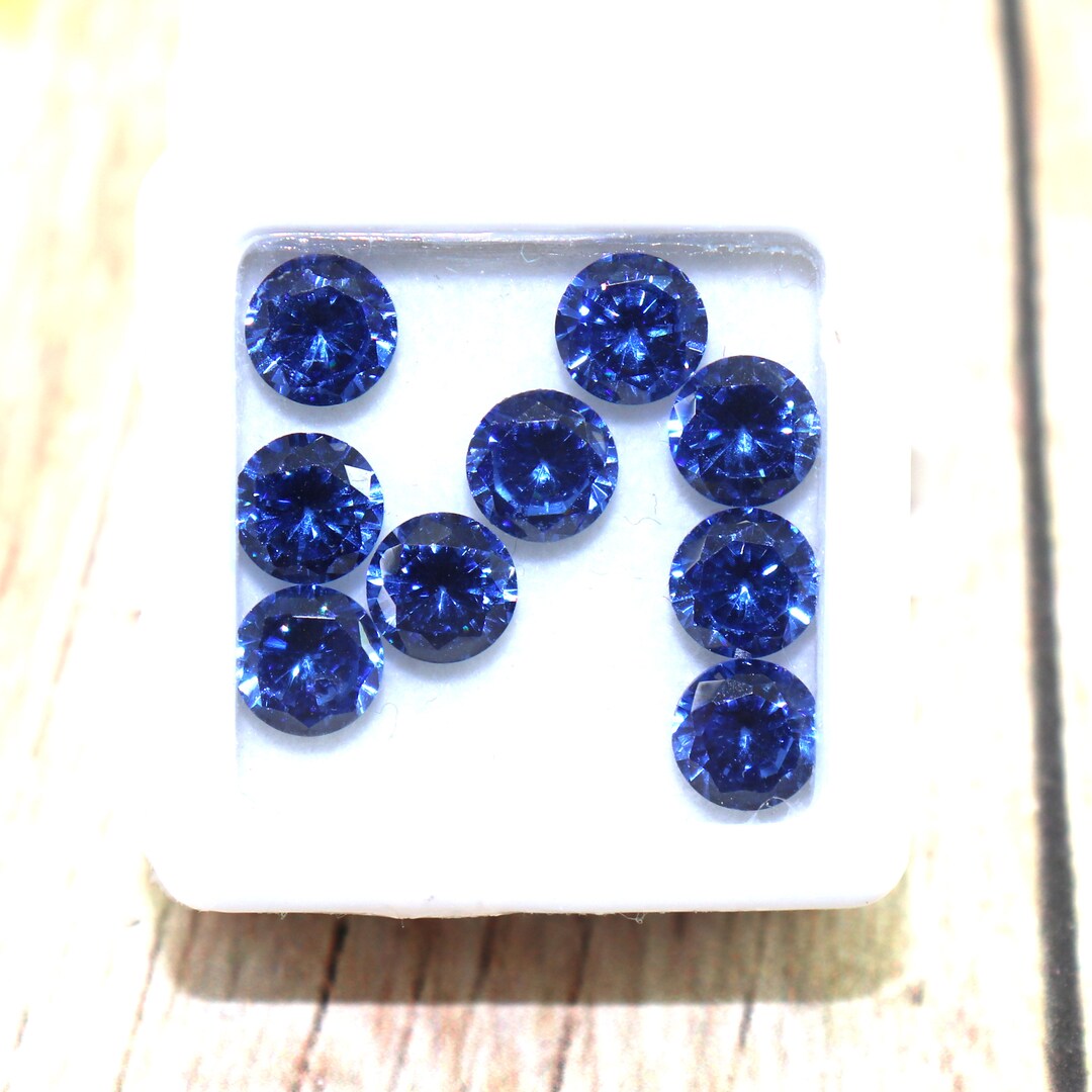 thumbnail image 2 of 20 Pcs Natural Blue Sapphire Loose Gems – 6mm Round Cut, Eye Clean, GGI Certified – Sri Lanka Origin 2 of 5