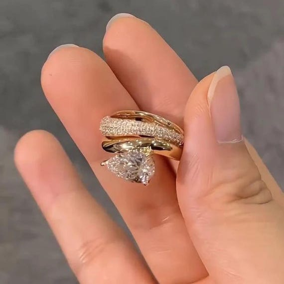 Pear Cut Moissanite Bridal Set: 18K Yellow Gold Engagement Ring & Curved Wedding Band