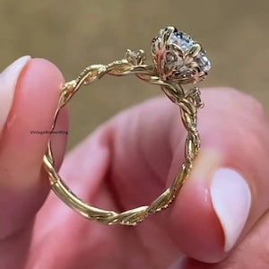 Oval Moissanite Halo Engagement Ring: 14K Gold Twisted Shank