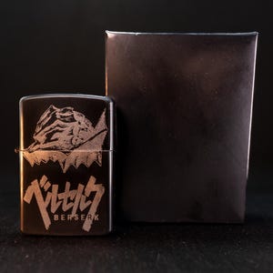 Berserk Anime Flip-Top Petrol Lighter – Engraved Berserker Design – Refillable Windproof Metal Lighter – Otaku Gift Black