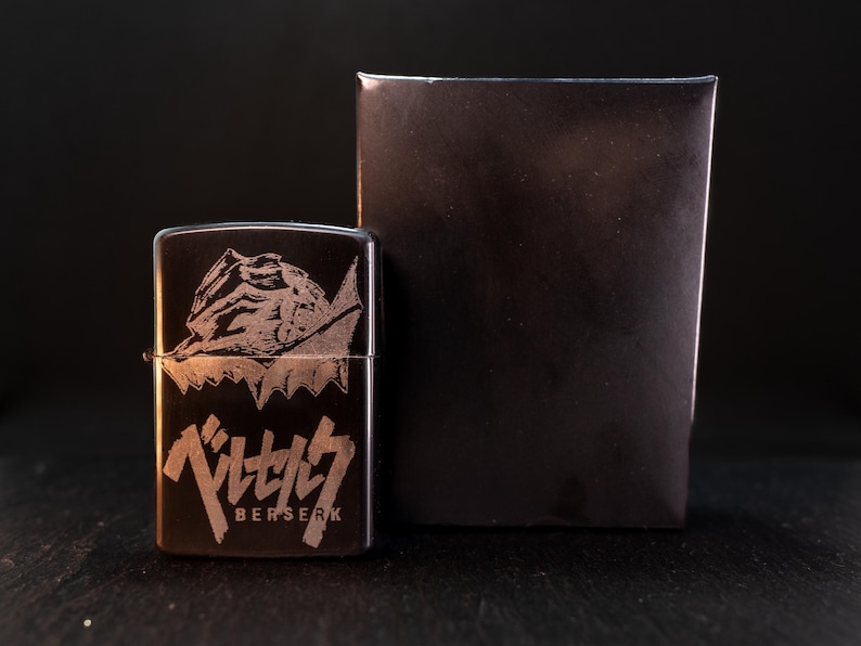 Berserk Anime Flip-Top Petrol Lighter – Engraved Berserker Design – Refillable Windproof Metal Lighter – Otaku Gift Black