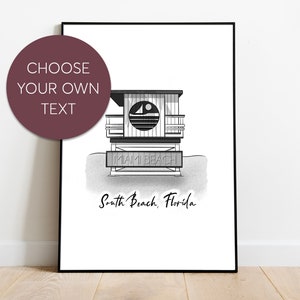 May include: Black and white illustration of a lifeguard stand with the text "Miami Beach" and "South Beach Florida" underneath.