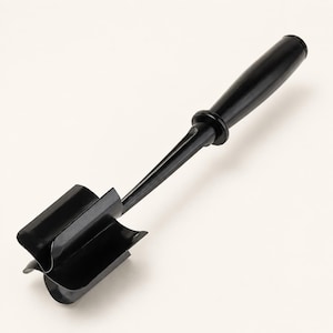 May include: A black kitchen tool with a long handle and a blade with four curved edges. The handle is cylindrical and the blade is rectangular. The tool is designed for chopping or mixing ingredients.