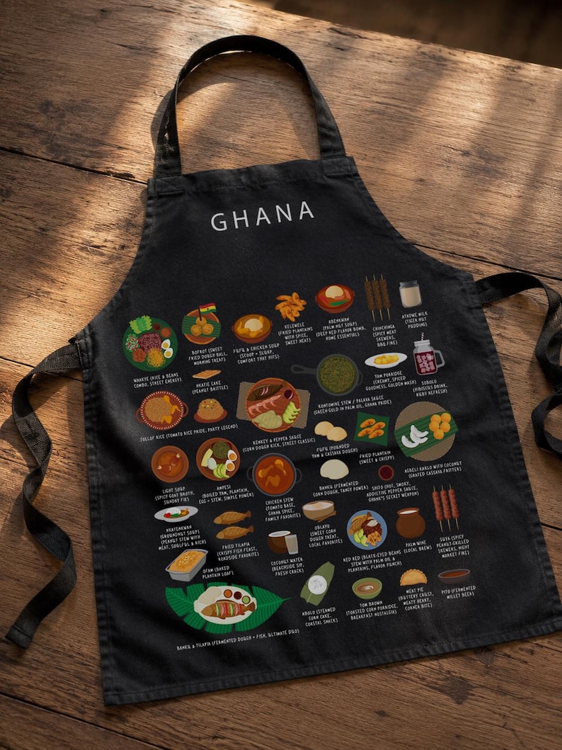 Ghana Food Apron featuring colorful illustrations of Jollof Rice, Kelewele, Fufu, Grilled Tilapia, Groundnut Soup, and Sobolo. Vibrant West African cuisine apron celebrating Ghana’s bold flavors and rich culture. Made from durable polyester canvas, perfect for home cooks and African food lovers. Ideal gift for foodies and travelers inspired by Ghanaian street food.