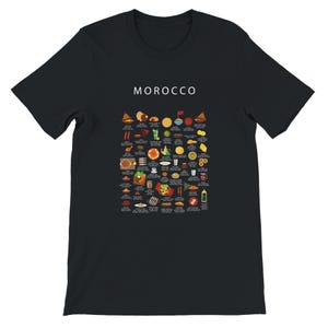 T-shirt featuring a colorful illustration of traditional Moroccan foods, including a steaming tagine, fluffy couscous, bowl of harira soup, fresh mint tea, and assorted sweet pastries, styled in a vibrant street-food design