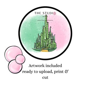 May include: A digital artwork featuring a green Emerald City illustration set against a split pink and green watercolor background. The artwork is in a black circular frame with the text "THE STUDI" and "CREATING HAPPINESS". Text below reads "Artwork included ready to upload, print & cut".